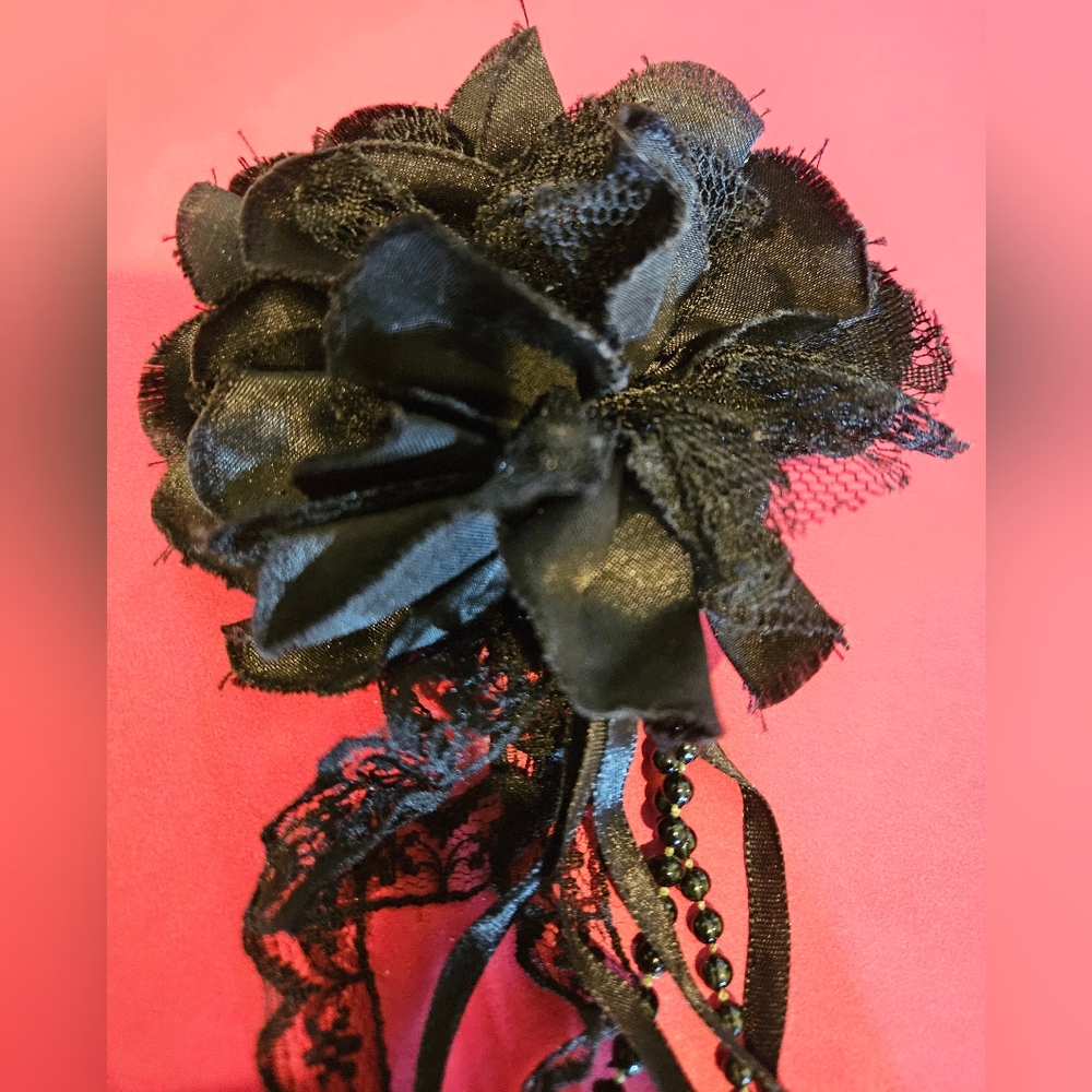 Black flower brooch